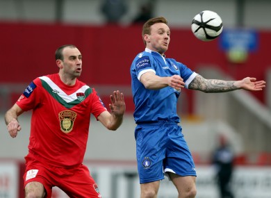 Dan Murray of Cork with Craig Curran of Limerick.
