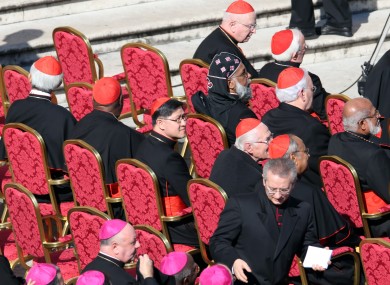 Cardinal Luis Antonio Tagle of the Philippines, centre, sits amongst other cardinals as they attend Pope Benedict XVI's last general audience.