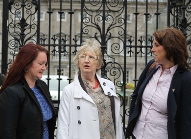 Ethel Buckley from SIPTU, Máire Mulcahy from ICTU Womens Council and Taryn Trainor from UNITE outside the Dail earlier today.