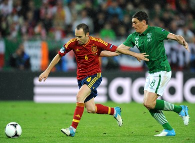 Andres Iniesta goes past Keith Andrews at Euro 2012.