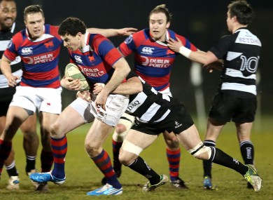 Richie Lane of 'Tarf in action against another black and white clad team.