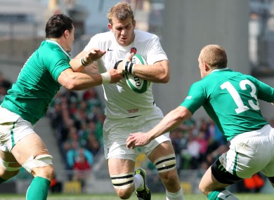 David Wallace and Keith Earls tackle Tom Croft in 2011.