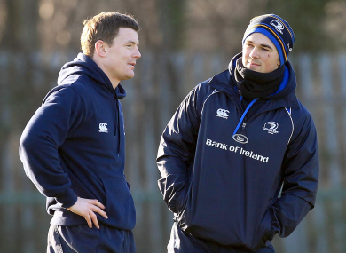 Brian O'Driscoll and Eoin O'Malley have a chat at a Leinster training session.