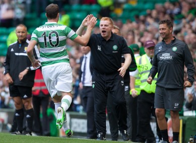 Stokes and Lennon celebrate Celtic's late winner.