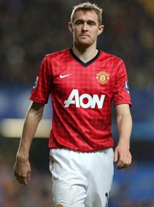 Manchester United midfielder Darren Fletcher has banned himself from entering the club's Carrington training ground until he has beaten the illness which has blighted him for the past three years.
