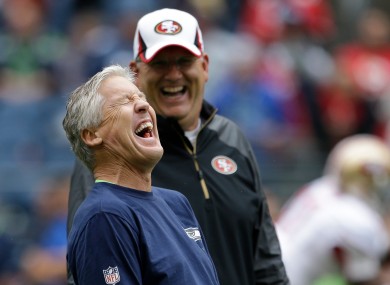 Seattle head coach Pete Carroll (foreground) had the last laugh over the 49ers last night.