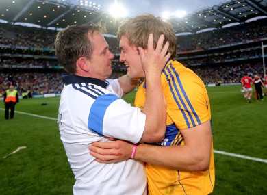 Clare's manager Davy Fitzgerald and Shane O'Donnell celebrate after the game.