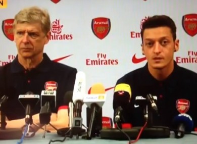 Ozil is unveiled alongside Wenger earlier today.