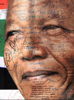 A portrait of former South African President Nelson Mandela with get well messages outside the Mediclinic Heart Hospital.