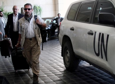 UN experts arrive at the Four Seasons hotel in Damascus last month.