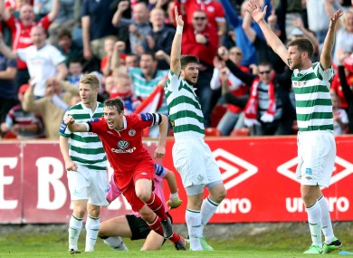 Danny Ventre of Sligo celebrates scoring the first goal of the game as Rovers players appeal for offside.