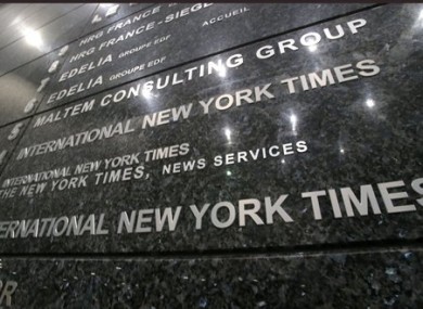 The changing times in Paris were reflected at the entrance to the International New York Times.