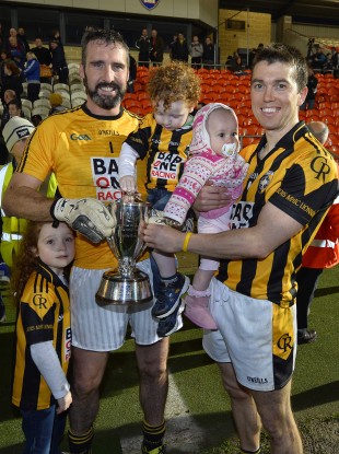 Crossmaglen's Paul Hearty with his children Breanne and Oran and Stephen Kernan with his daughter Sophie.
