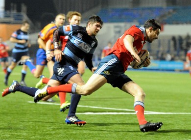 Felix Jones of Munster runs in to score a try.