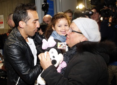 Belounis with his daughter and mother at Charles de Gaulle Airport today.