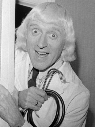 Jimmy Savile visits the patients and staff of Leeds General Infirmary in 1972.