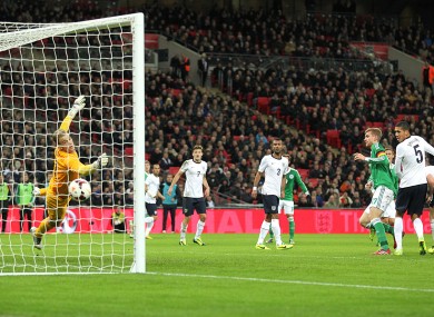 England goalkeeper Joe Hart fails to stop a header from Germany's Per Mertesacker (right) for their opening goal of the game.