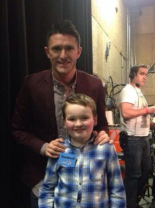 Robbie Keane after the Late Late Toy Show with young guest Domhnall O’Confhaola.