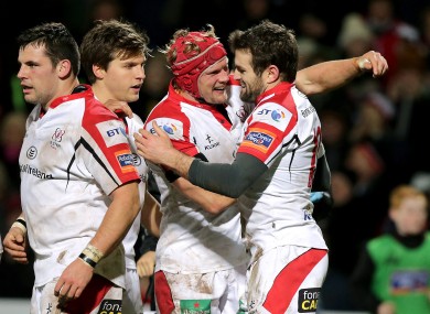 Mike McComish congratulates try scorer Jared Payne.