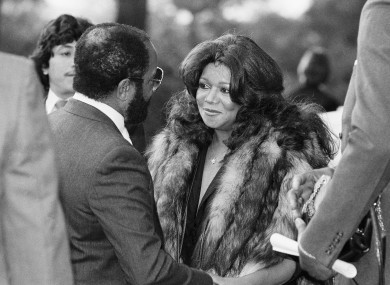 Motown Records founder Barry Gordy offers consolation to his sister Anna Gordy Gaye at a public visitation of Marvin Gaye's body in 1984.