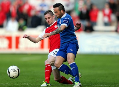 Ian Bermingham of St Pat's and Sligo striker Rafael Cretaro.
