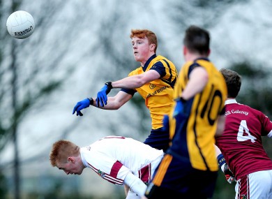 DCU's Conor McHugh scores his side's third goal.