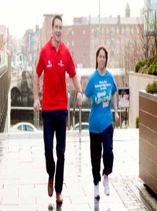 David Wallace and Christine Delaney get some running practice in.