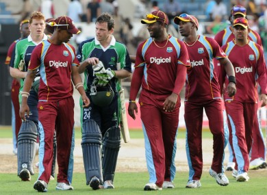Ireland's Ed Joyce leaves the field after victory.