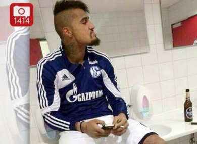 Boateng pictured smoking with a bottle of beer beside him.