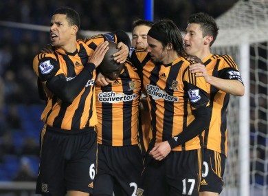 Hull City's Yannick Sagbo (second from left) is congratulated by team mates after scoring the equalizer for his side.