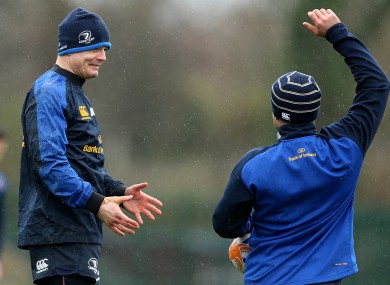 Brian O'Driscoll shares a joke with Ian Madigan at Leinster's training session.