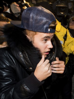 Justin Bieber turning himself in to city police in January.