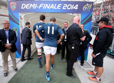 Sion Zebo trudges down the tunnel after Munster's defeat.