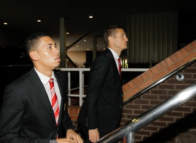 Smalling and Vidic arrive for a game recently.
