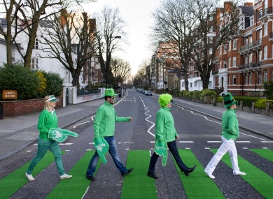 The zebra crossing on Abbey Road is turned green for St Patrick's Day.