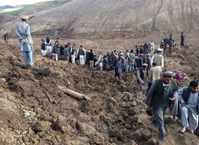 Afghans search for survivors.