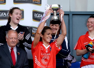 Caitlin Malone lifts the trophy for Armagh.