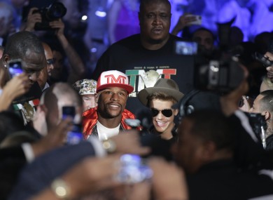 Floyd Mayweather Jr., right, connects with a right to the head of Marcos Maidana.