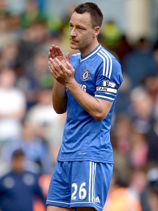 Chelsea captain applauds fans at full time.