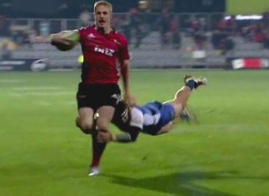 Cummins makes a gutsy tackle to prevent a try.