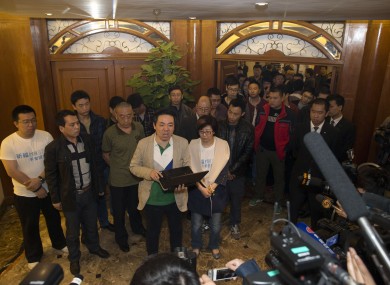 File photo of relatives of passengers aboard the Malaysia Airlines flight.