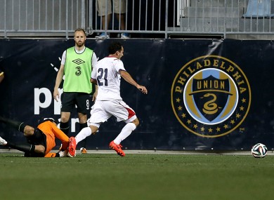 Ireland goalkeeper David Forde concedes a penalty.