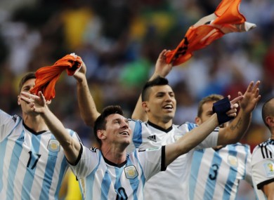 Lionel Messi soaks up Argentine adulation after the 1-0 win over Belgium.