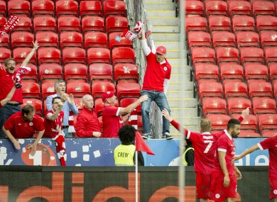 Danny North celebrates scoring Sligo Rovers' second goal with fans.