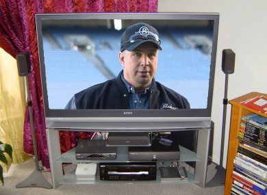 Yes, we Photoshopped Garth Brooks' face amateurishly onto a TV screen. What about it?
