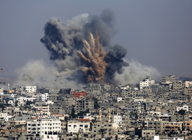 Smoke and fire from the explosion of an Israeli strike rise
