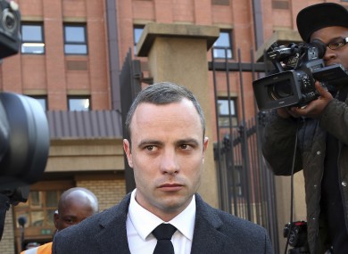 Oscar Pistorius leaves the high court in Pretoria.