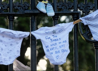 Justice for the Tuam Babies march. Items of baby clothing were tied to the railings at the back of Leinster House.