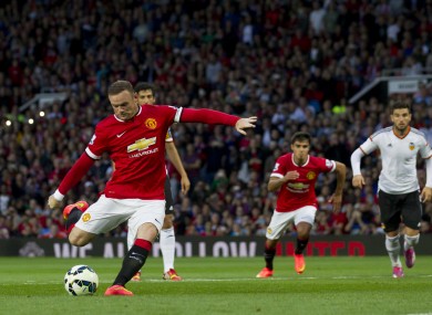 Wayne Rooney misses a penalty during his team's pre season friendly soccer match against Valencia tonight.