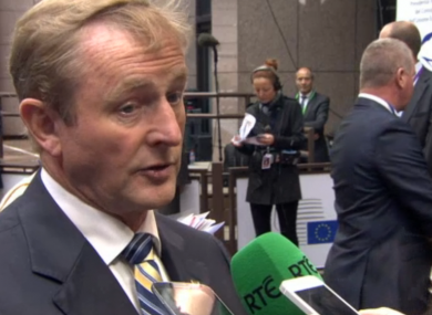Enda Kenny talks to reporters in Brussels.